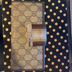 Gucci coated canvas wallet